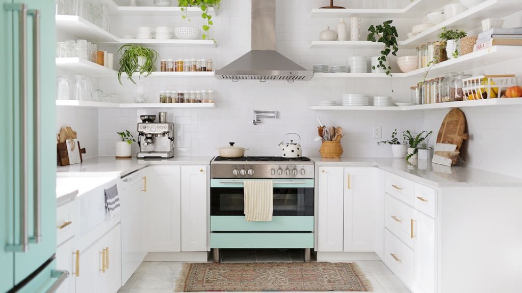Small kitchen renovation with smart storage cabinets and space-saving layout design